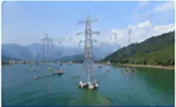 Urban river transmission towers